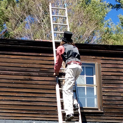 Quddus climbs a ladder