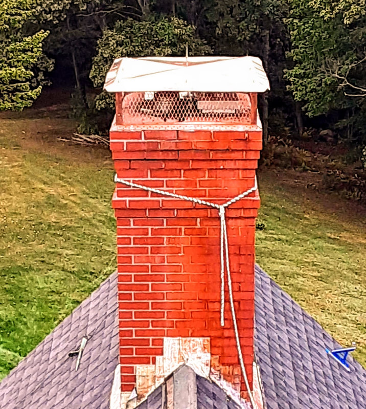 Picturechimney with cap and flashing